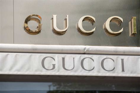 is gucci a publicly traded company|who is gucci owned by.